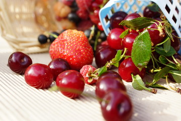 Sweet summer berries: strawberries, cherry, currant, raspberry