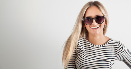 Portrait of a young woman with sunglasses