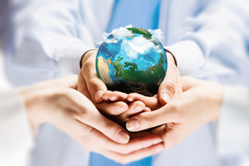 Earth planet in hands