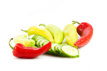 chilli and cucumber isolated on white background