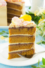 Pumpkin cake with chocolate and caramel cream.