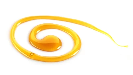 Photo sur Plexiglas Bonbons maple syrup swirl on white background