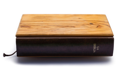 The Bible soaring in the air.