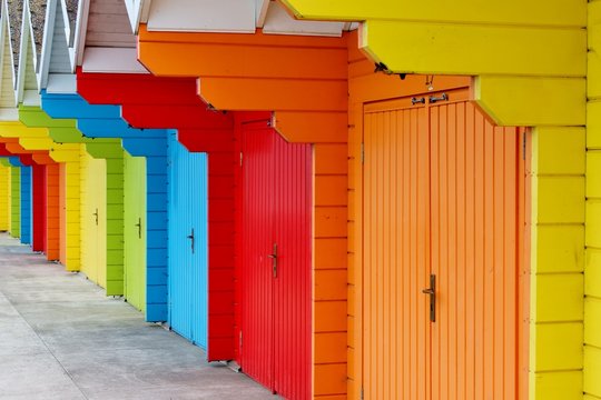 beach huts in house paint at Scarborough Colorful English stock, photo, photograph, picture, image, 