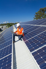 Solar panels with technician
