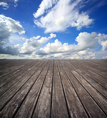 Fototapeta na wymiar blue sky and wood floor, background