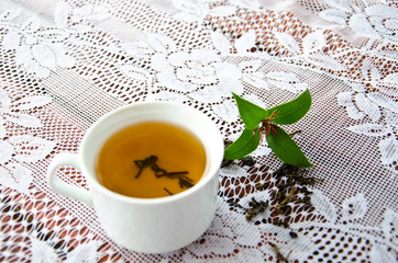 dried tea on spoon wood on the table