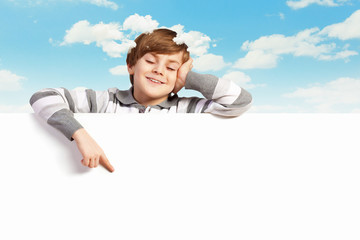 Boy with a blank billboard