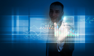 Young businessman touching icon