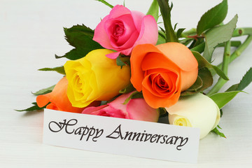 Happy Anniversary note with colorful bouquet of roses