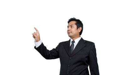 Successful young business man pointing at something interesting