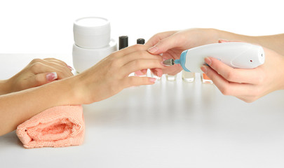 Manicure process in beauty salon, close up