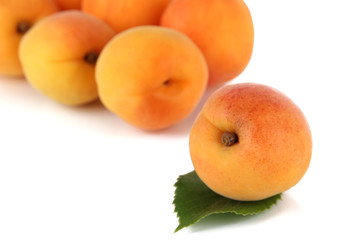 Naklejka na ściany i meble Apricots isolated on white