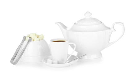 Cup of coffee,sugar-bowl and teapot isolated on white