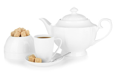 Cup of coffee, sugar-bowl and teapot isolated on white