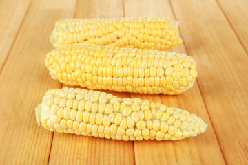 Fresh corn on wooden background