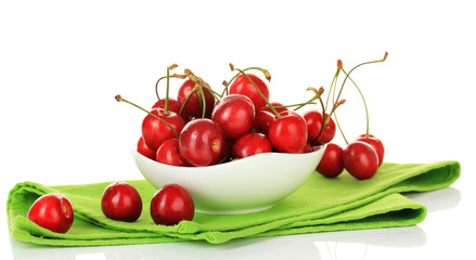 Cherry berries in bowl isolated on white
