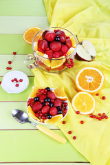 Useful fruit salad in glass cup and bowl