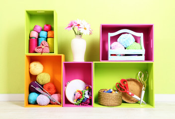 Colorful shelves of different colors with utensils