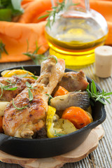 Fried chicken legs with vegetables.