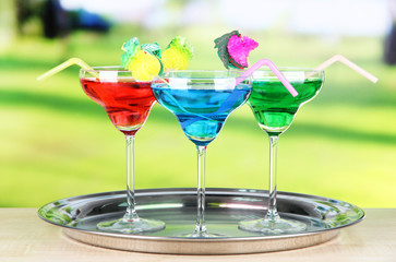 Different cocktails on bright background