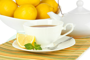 Cup of tea with lemon close-up