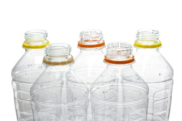 close up of used plastic bottles on white background with clippi