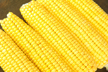 Crude corns on wooden table