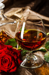 Vintage cognac with rose