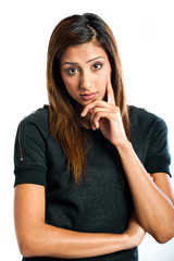 Beautiful young Indian model in a thoughtful pose