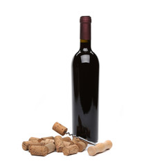 bottle of wine, corks and corkscrew.