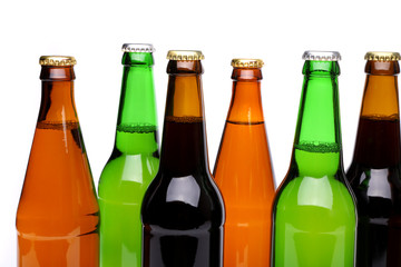 Bottlenecks. Bottles of beer. Close up.