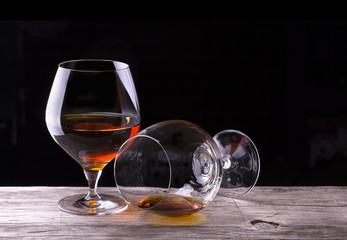 Cognac or brandy on a wooden table