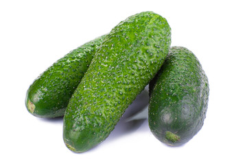 Healthy food. The green cucumbers isolated on white background