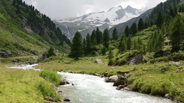 Time lapse of clouds and Stream water at Zillertal alps