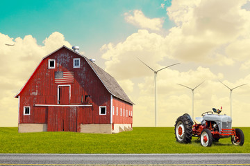 Fototapeta premium The traditional American red barn in rural setting