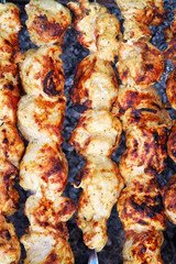 Shish kebab close-up. Slices of meat in marinade