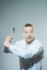 man with hammer