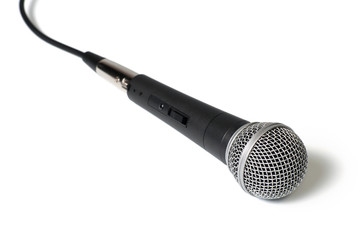 A microphone with a cord, isolated on a white background
