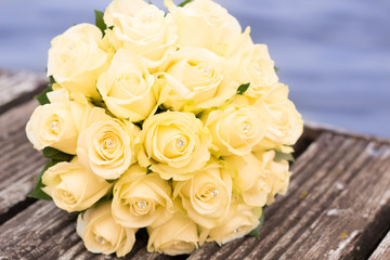 Wedding bouquet lying on pier
