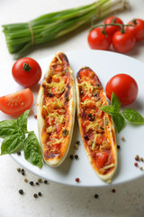 Pizzabaguettes Tomate-Basilikum