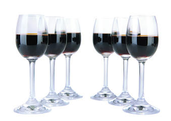 Glasses of liquor, isolated on white