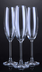 Empty glasses on grey background