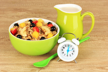 Oatmeal with fruits on table close-up