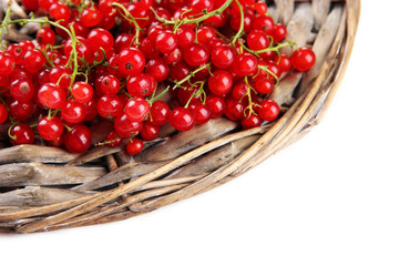 Ripe red currant isolated on white