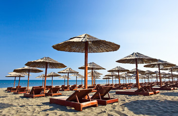 sunbeds and parasols on the beach