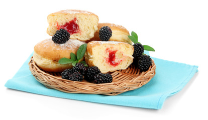 Tasty donuts with berries, isolated on white