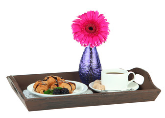 Wooden tray with breakfast, on wooden table, isolated on white