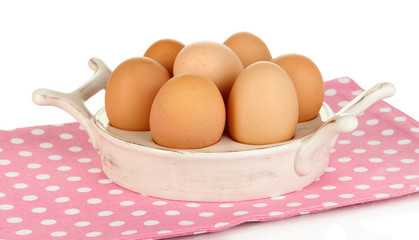 Eggs in plate for eggs isolated on white
