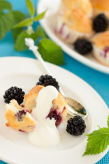 Muffins with blackberries.